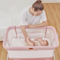 Baby Bassinet Bedside Crib with Mattress & Sheet, 4-Sided Mesh, Pink T58859