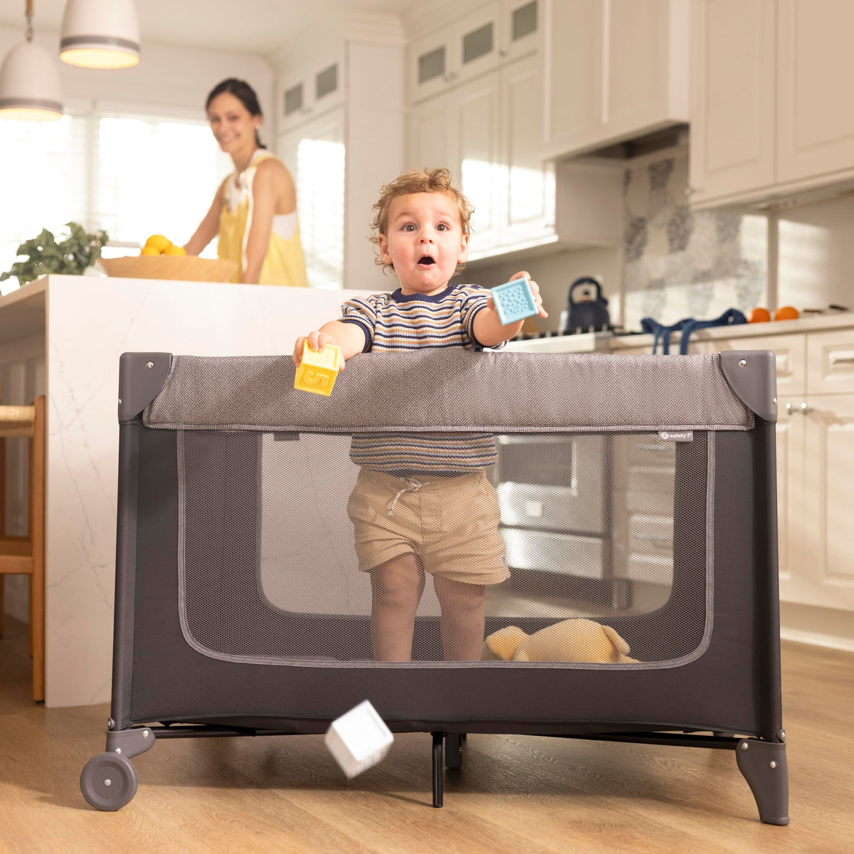 4-in-1 Portable Play Yard with Bassinet and Changer C248062