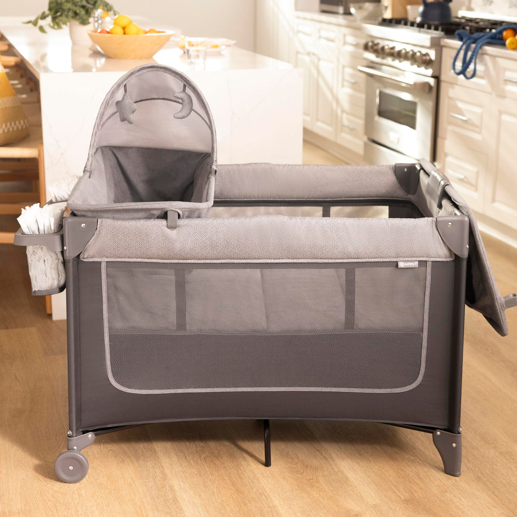 4-in-1 Portable Play Yard with Bassinet and Changer C248062